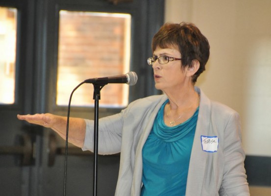 Teresa Parker speaking at her book launch party.