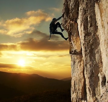Climber on sunset