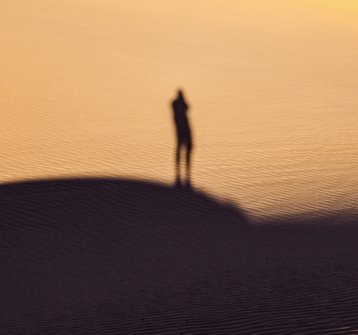 shadow of a man in the desert