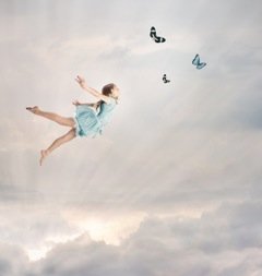 stockfresh_1930376_little-girl-flying-at-twilight_sizeXS
