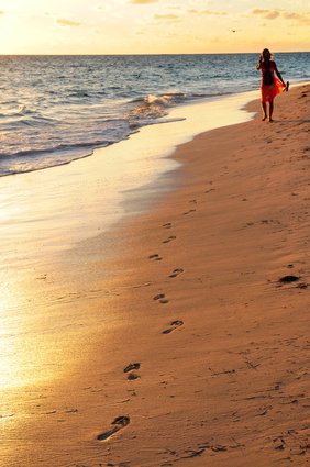 Woman walking on beach