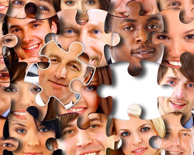 abstract puzzle-people background with one piece missing